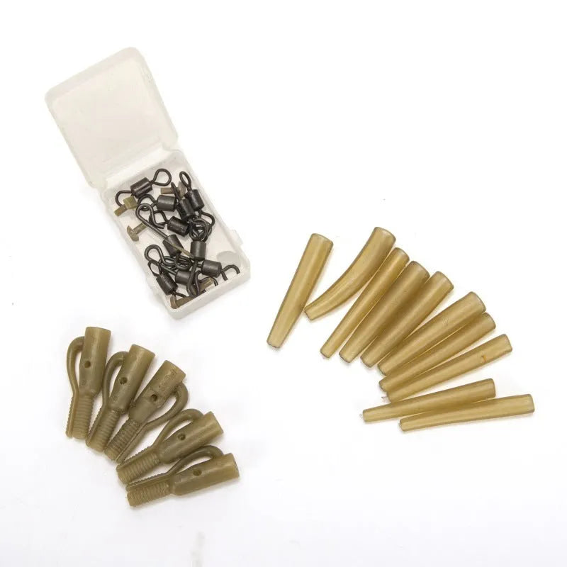 30 piece European carp fishing accessory set with components organised on card