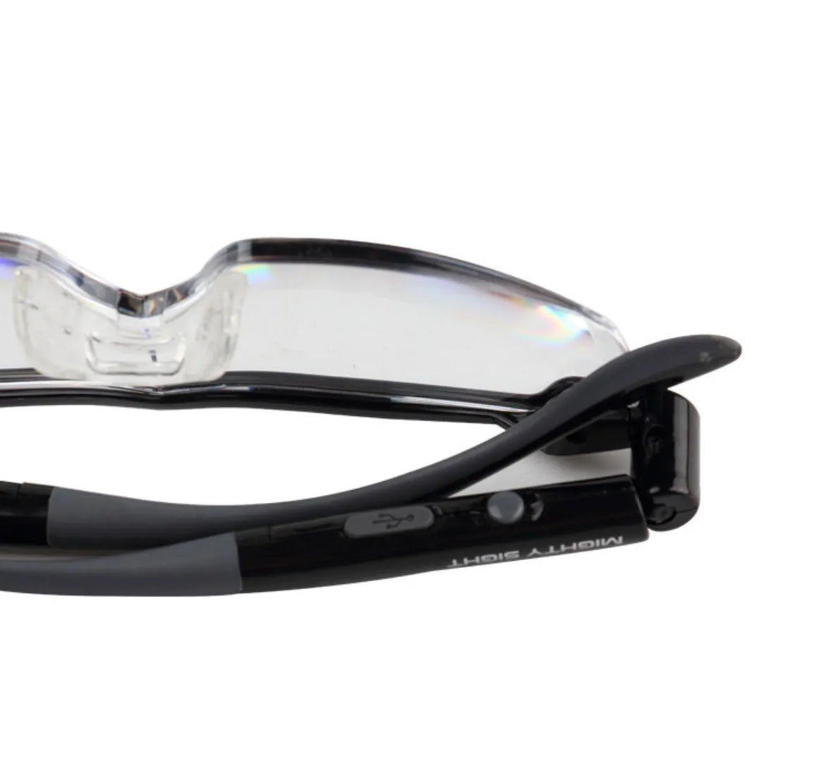 Transparent black USB LED reading glasses with integrated lighting, shown on reading material