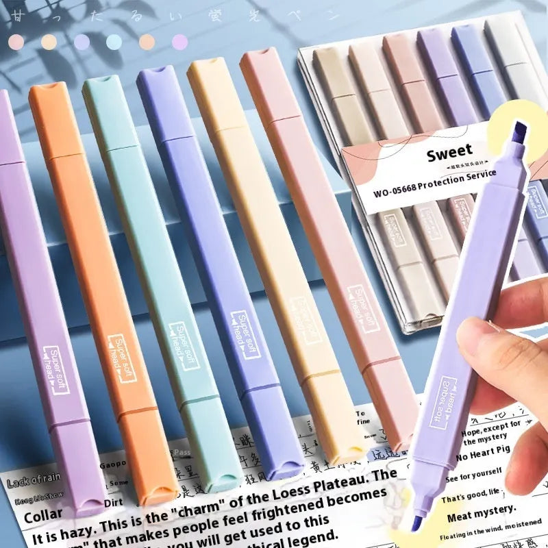 Double-headed fluorescent marking pens showing two different coloured tips on each pen
