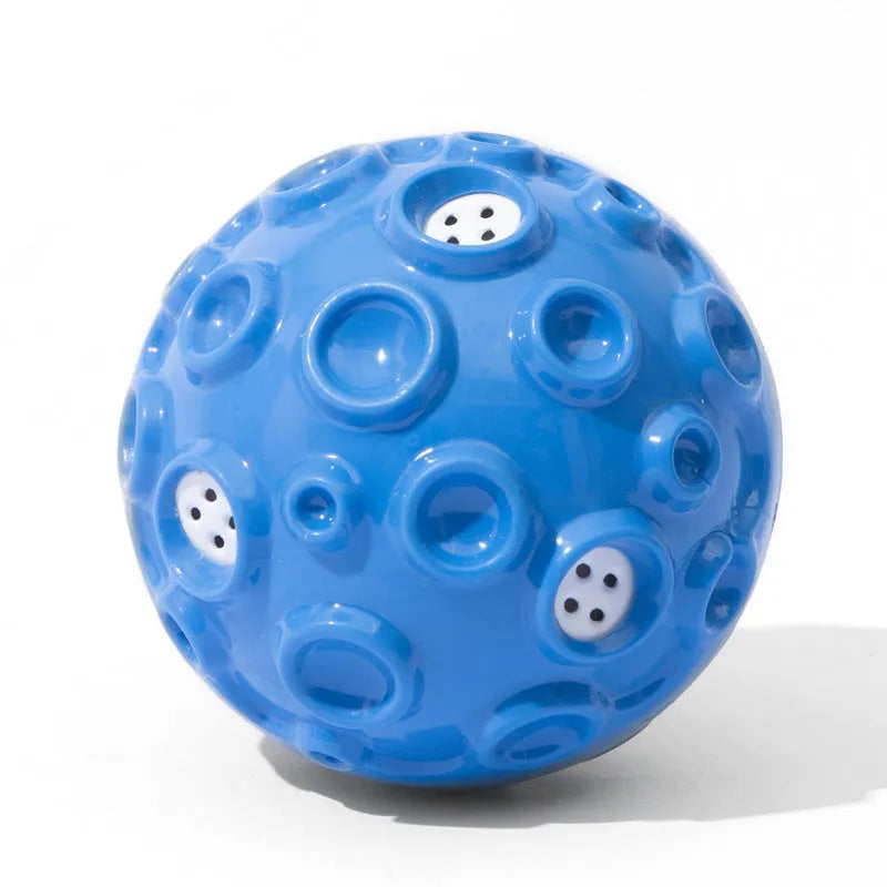 Colourful durable dog chew ball with textured meteorite bumps for teeth cleaning