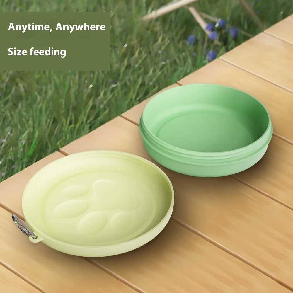 Folding portable dog bowl with snack compartment in pink and green colour options