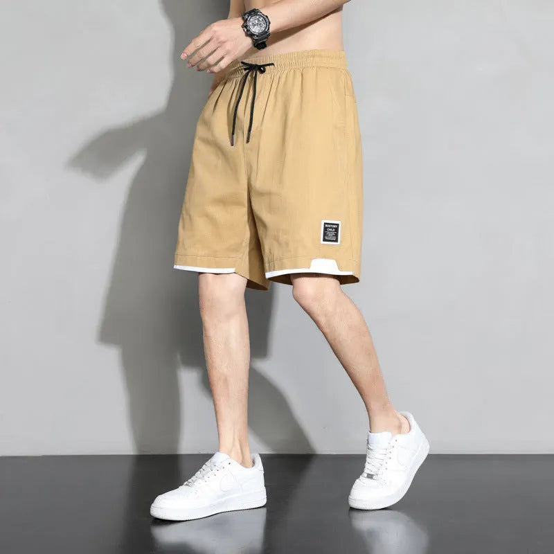 Cotton shorts for boys in black, khaki or white colours with mid waist design and extended sizing options
