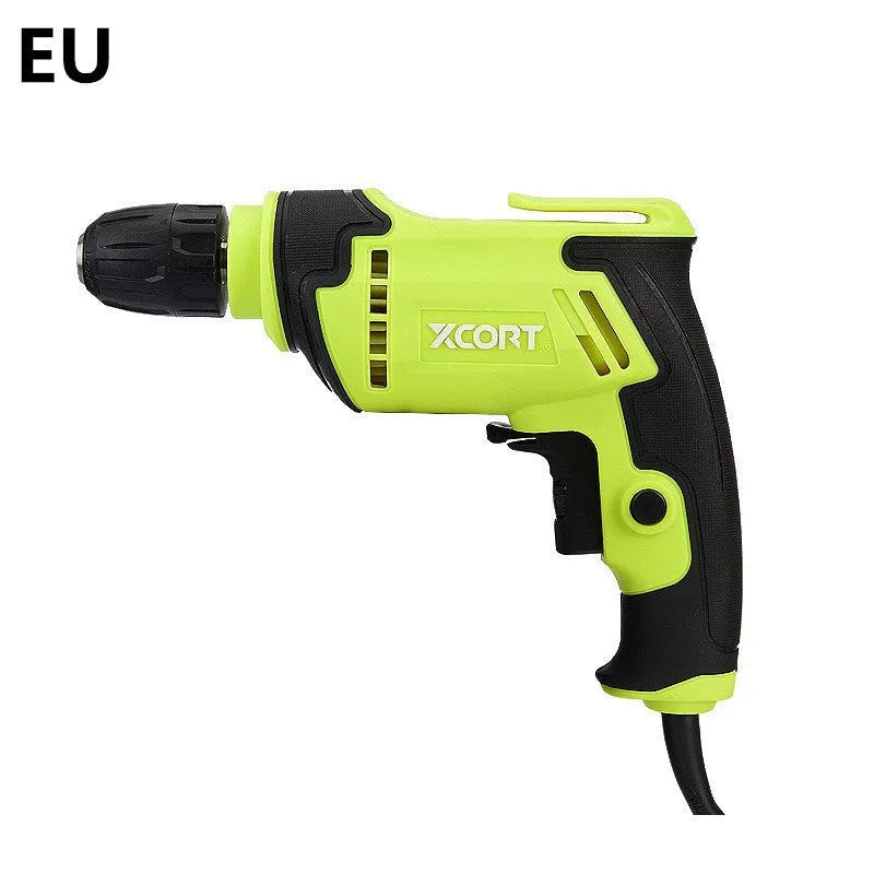 Pistol grip electric power drill with a 10mm keyed chuck on a workbench.