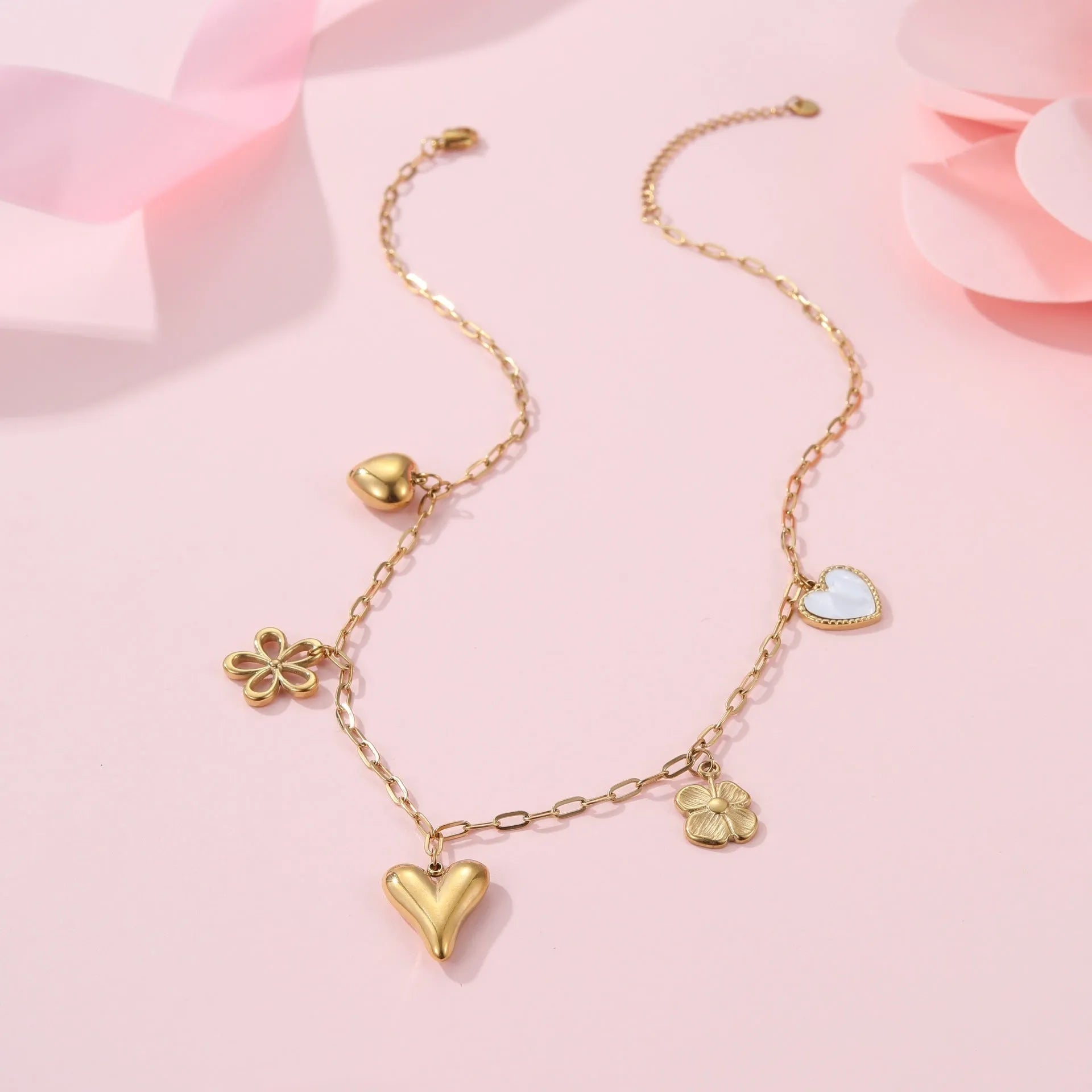 Stainless steel necklace with geometric sun pendant on regular chain, 18K electroplated finish