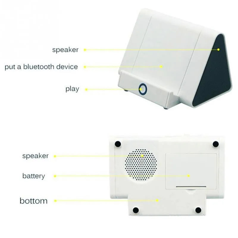 Black and white wireless mini Bluetooth speaker with charging cable