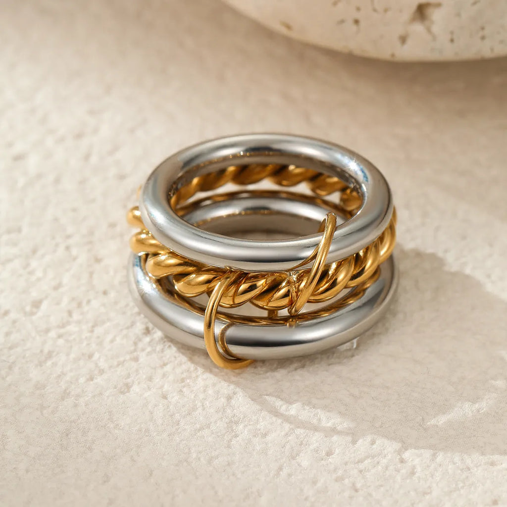 Stacked stainless steel ring set with gold plating in three colour variants