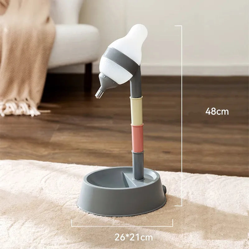 Green adjustable height pet water dispenser with detachable pole and bowl on a floor.
