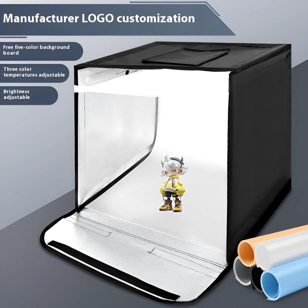 Foldable 50cm studio photo light box with integrated three-colour LED panel and reflective cloth interior.