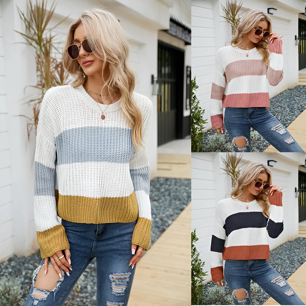 Women's pink and dark blue striped loose pullover with short length on hanger