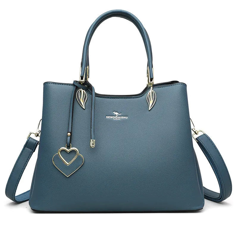 Women's PU leather messenger bag in multiple colours with cross-body strap and stitching detail