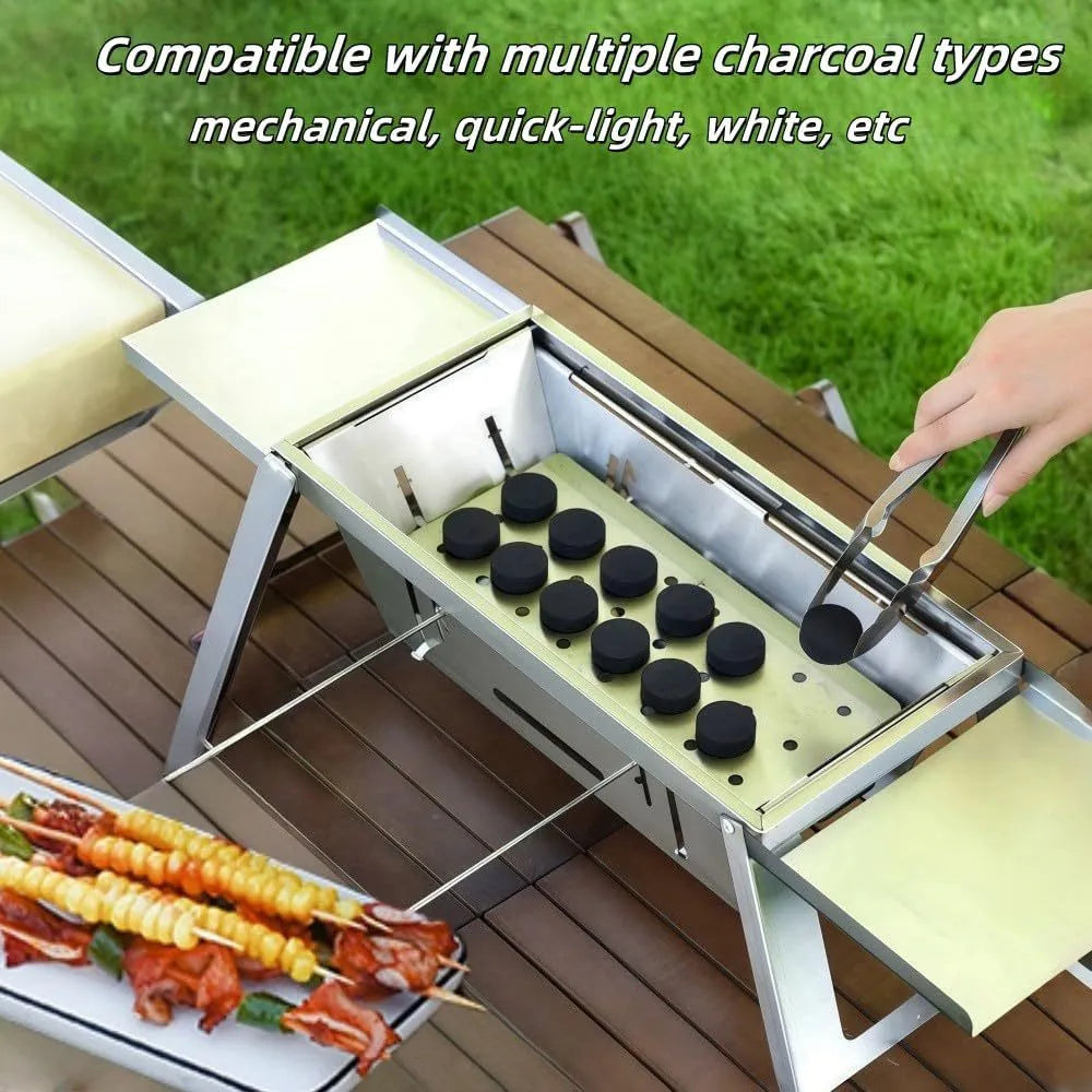 Small foldable portable charcoal grill shown in an outdoor setting