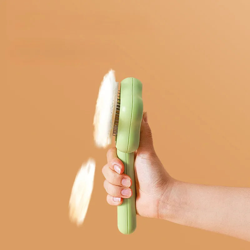 Green self-cleaning cat comb with stainless steel needle pins for pet grooming