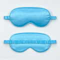 Double-sided Rayon elastic satin sleep mask shown in multiple colour options including sky blue, black, wine red, and light pink.