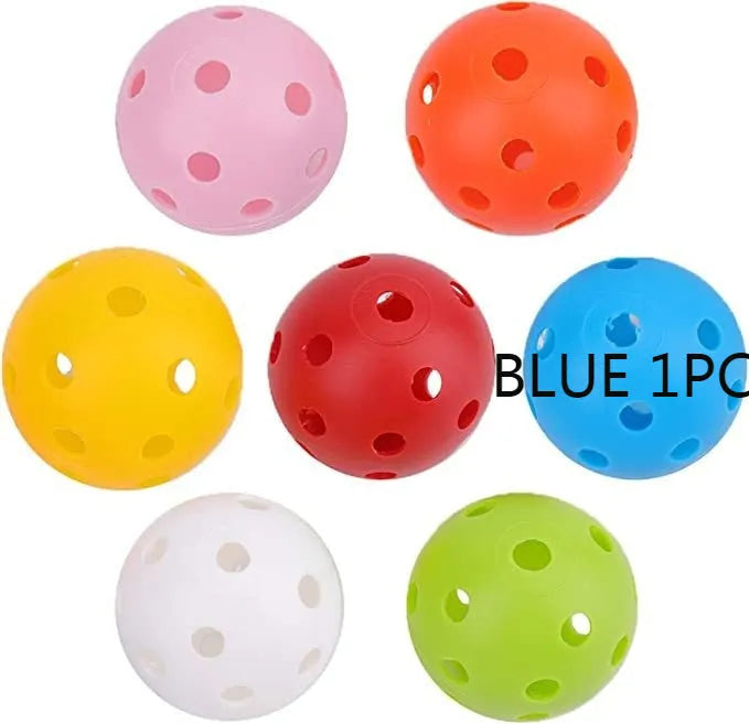 Six multi-colour 42mm golf practice balls in red, orange, blue, green, white, and yellow in a net.