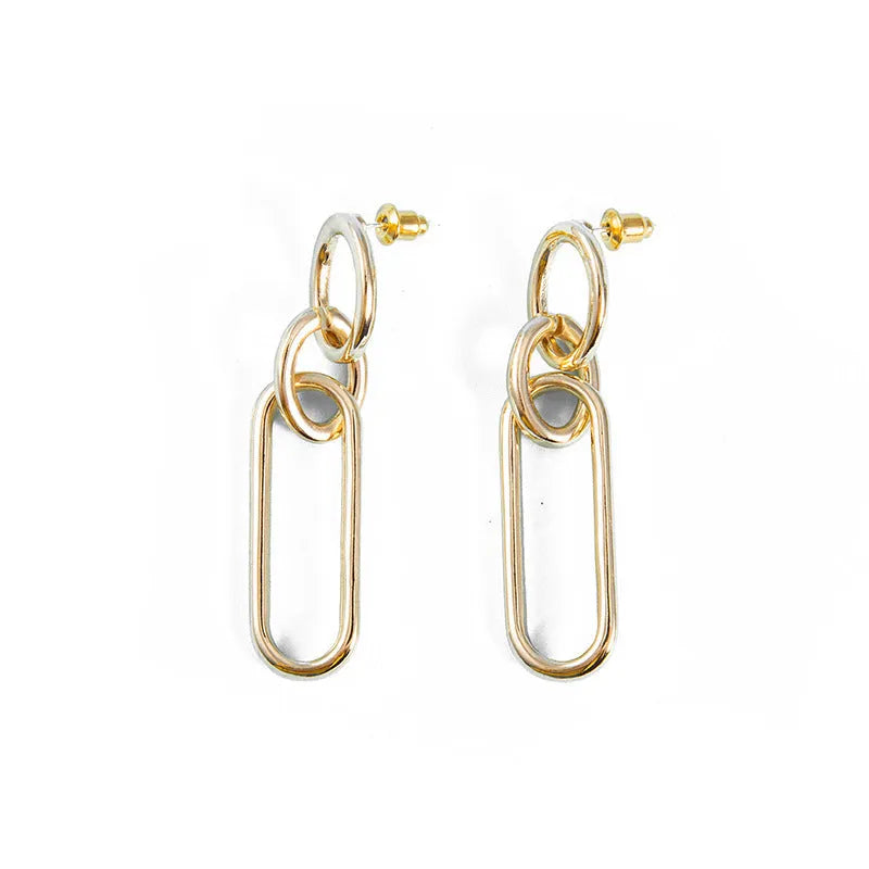 Geometric sterling silver needle hoop earrings with ring and line design in alloy metal
