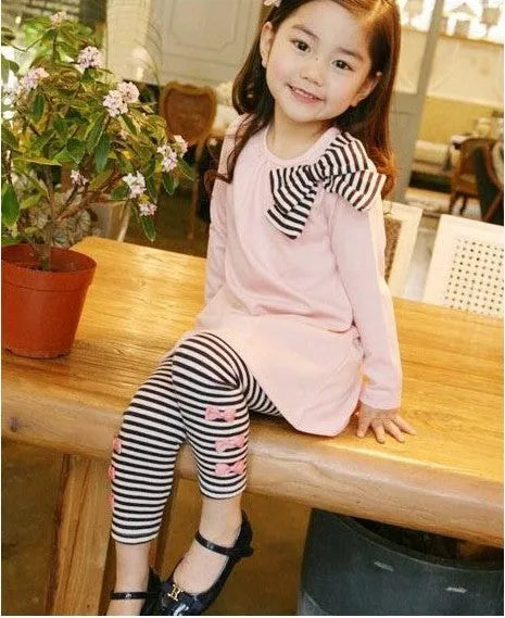 Pink cotton girls clothing set shown in sizes for 110cm, 120cm, 130cm, and 140cm.