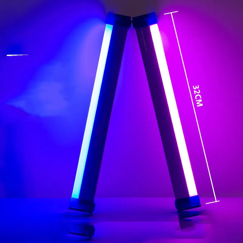 Rechargeable dimmable LED tube light in blue and purple colours shown in a bedroom setting.