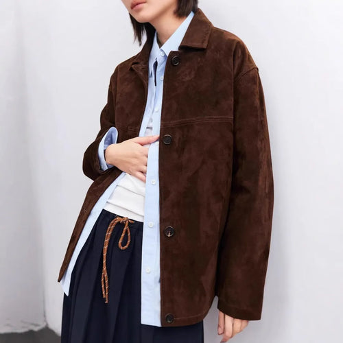Women's mid-length art retro cashmere coat with Peter Pan collar and leather stitching in loose fit.