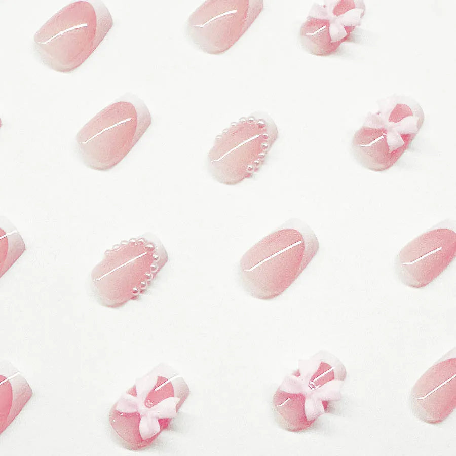 French manicure false nails set with white tips featuring tulip, bow, starry sky and leopard print patterns