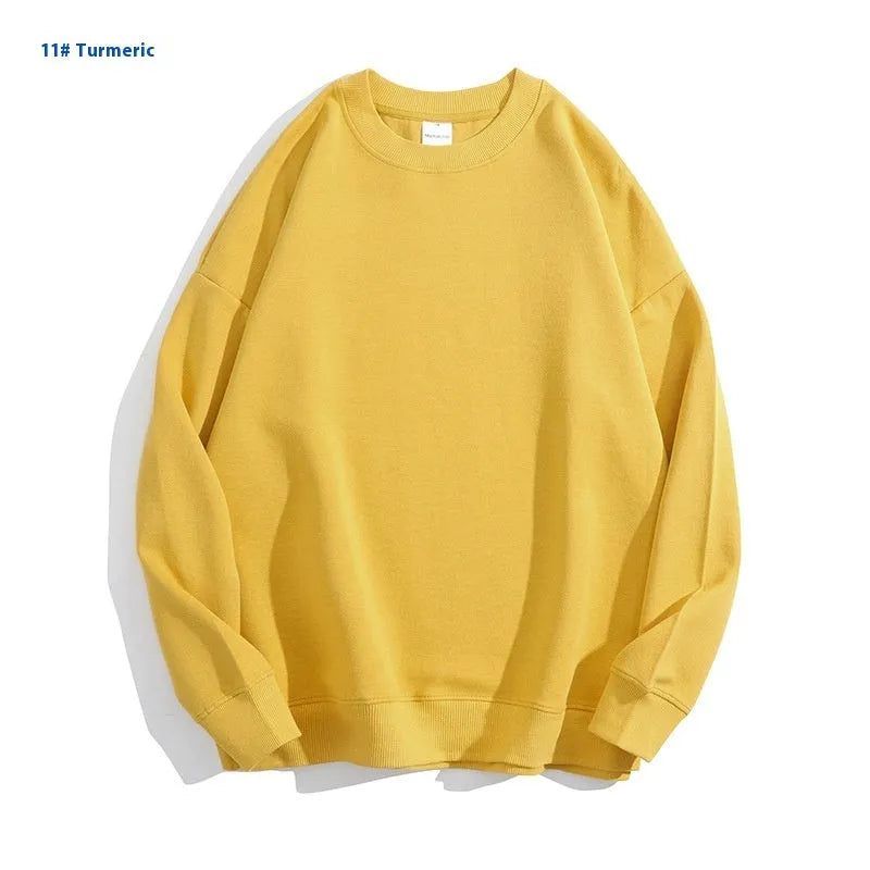 Women's loose fit cotton off shoulder sweater in a solid colour with round neck and long sleeves.