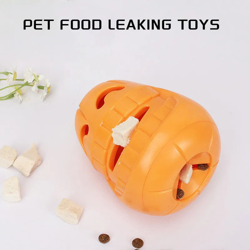 Orange Halloween pumpkin shaped rubber dog toy with a treat-dispensing funnel.