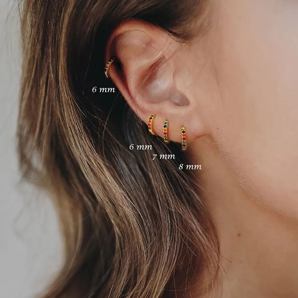 Geometric circle stud earrings with perforated pattern in gold, rose gold, or silver colour