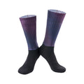 Pair of breathable athletic socks for running and cycling in orange colour on a grey background