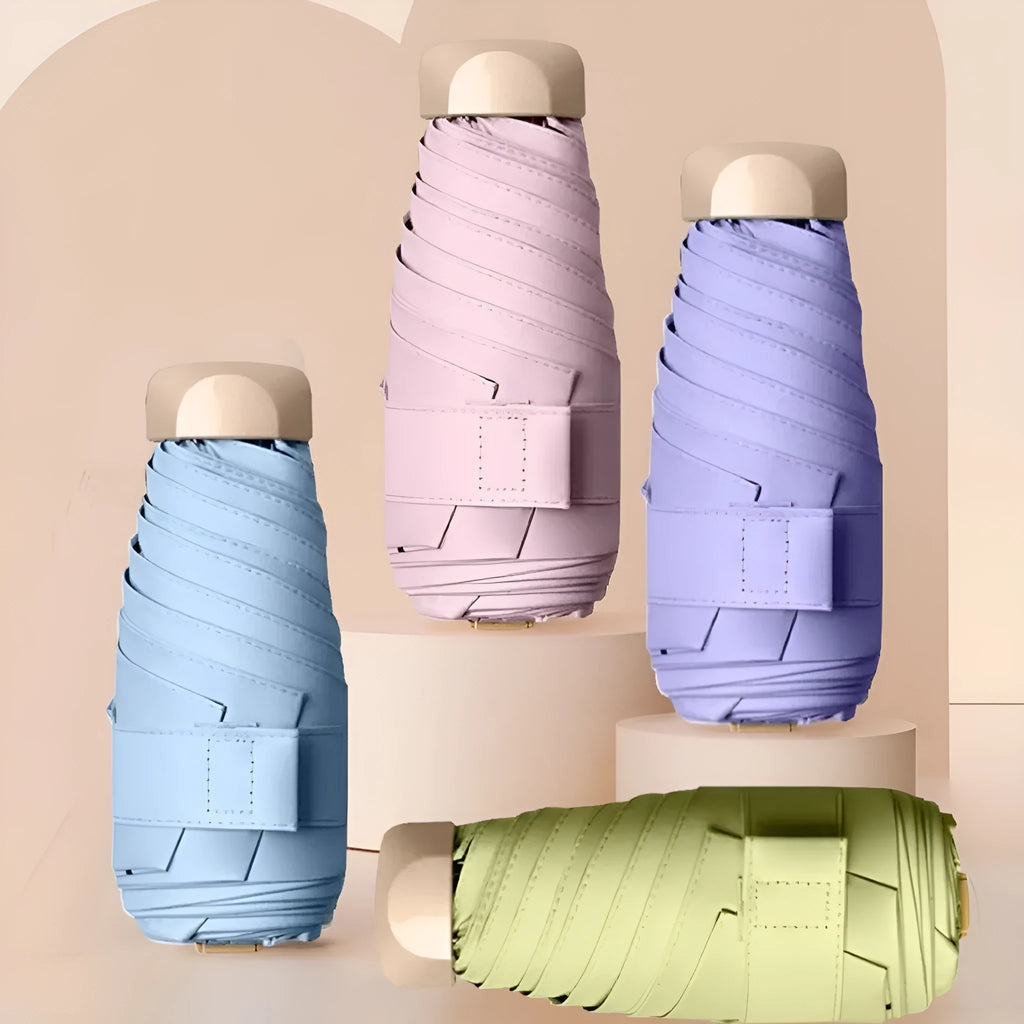 Five-fold manual umbrella with gradient vinyl sunshade showing six alloy bones in beige colour option