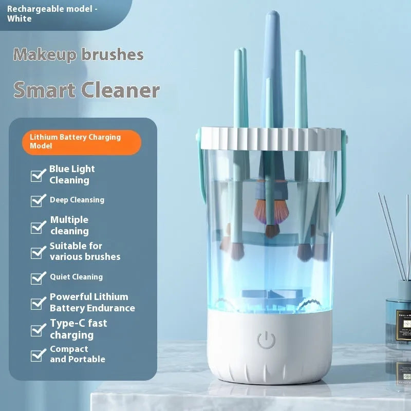 White plastic rechargeable makeup brush cleaning machine measuring 24cm with included data cable
