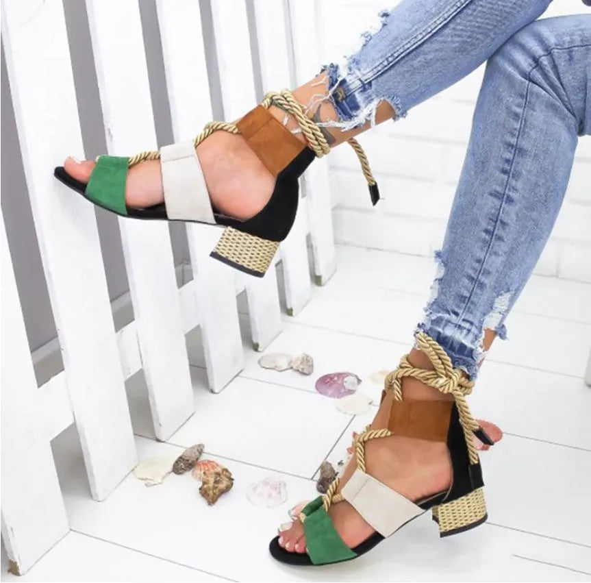 Women's beige suede sandals with front strap, fish mouth toe, and a colour-matching middle heel