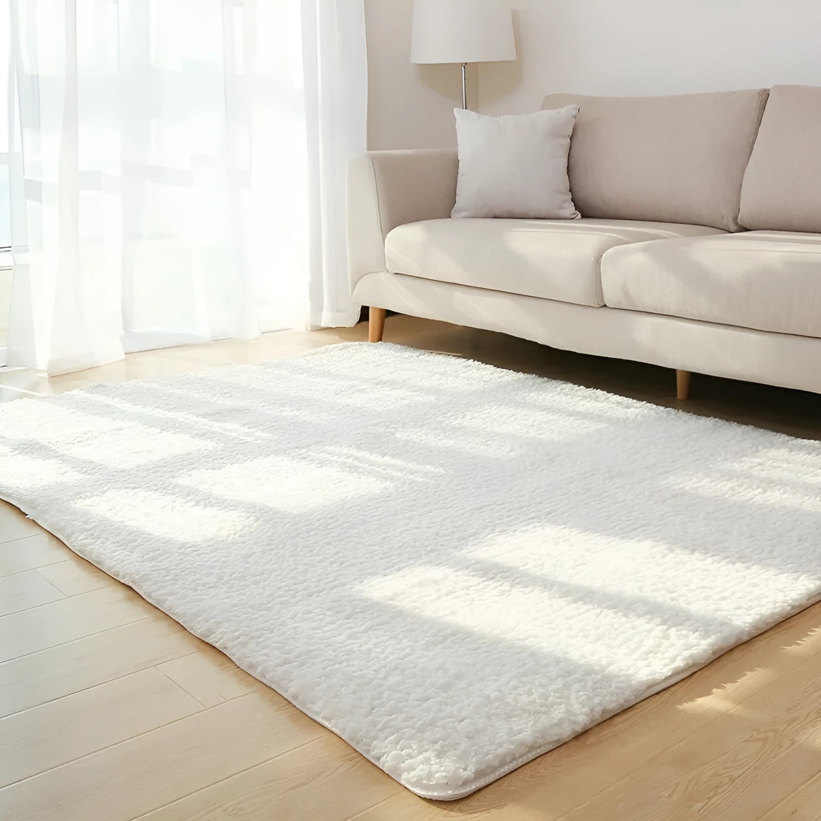 Solid colour fluffy plush rectangle carpet showing soft pile and non-slip dotted bottom.