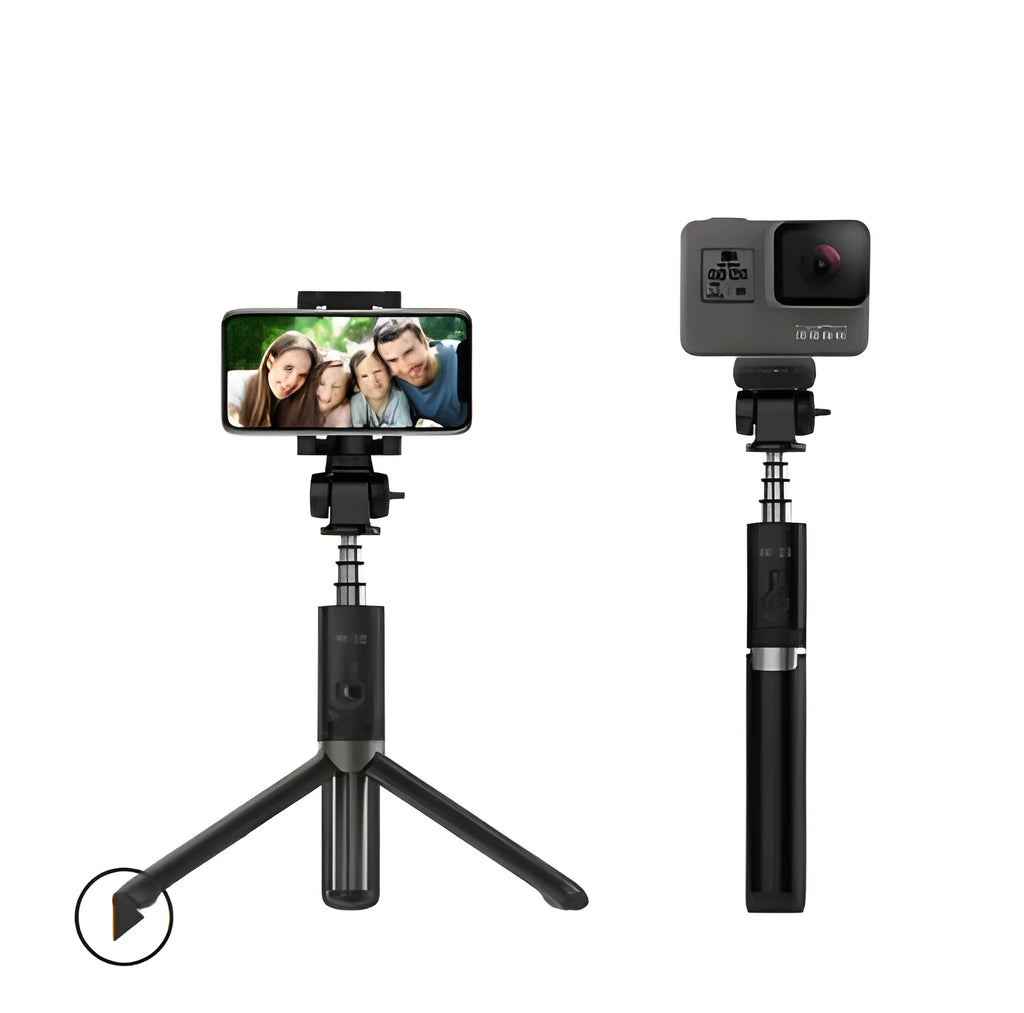 Aluminium alloy Bluetooth tripod selfie stick with remote control extended, holding a mobile phone.