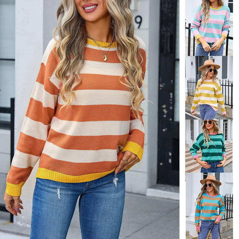 Women's loose-fit long sleeve floral sweater in blue, acrylic fabric, round neck.
