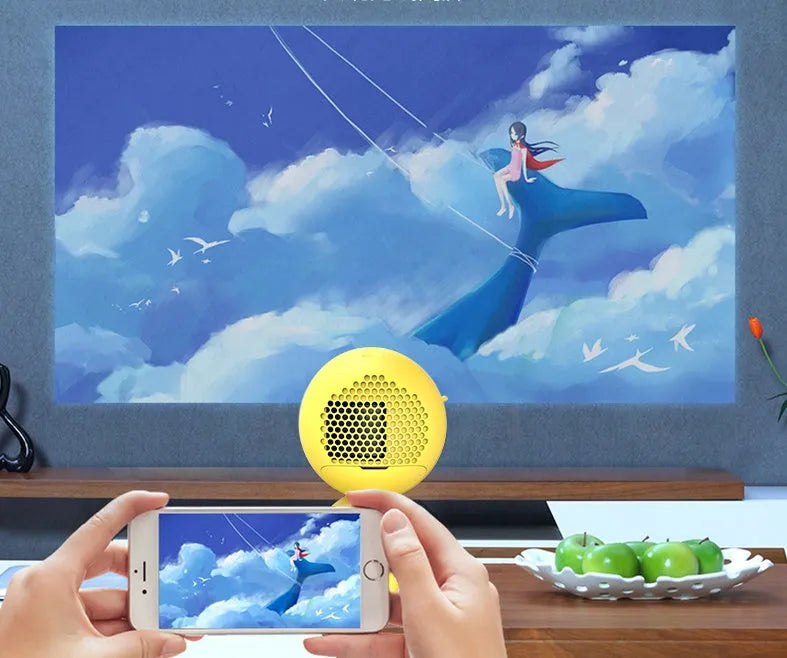 YG220 LED projector in yellow or white showing 1080P support and 24-80 inch projection capability