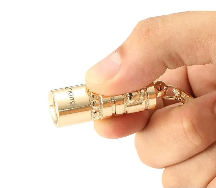 Gold zinc alloy mini waterproof LED flashlight keychain for outdoor emergency use