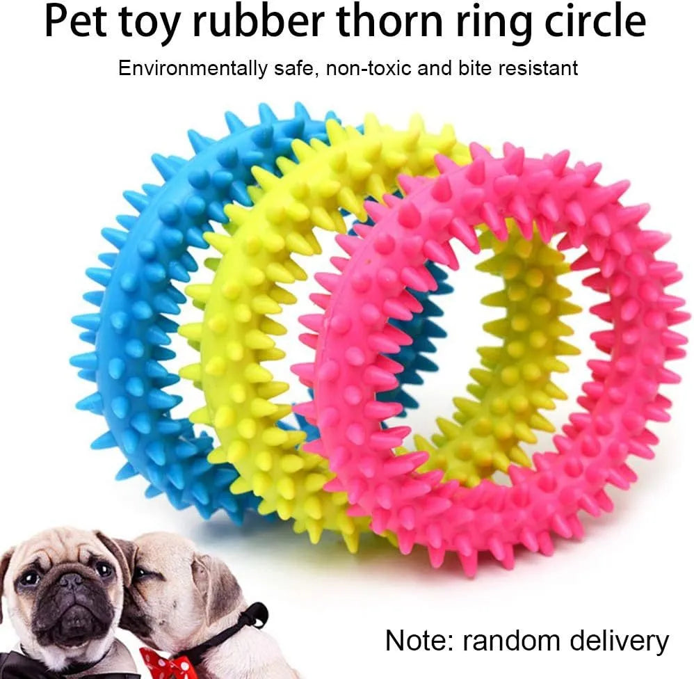 Blue TPR spiky ring dog chew toy with dental cleaning nubs on a white background