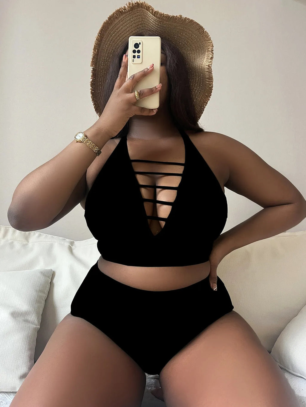 Plus size woman in a solid green halter bikini with adjustable straps and high waist briefs.