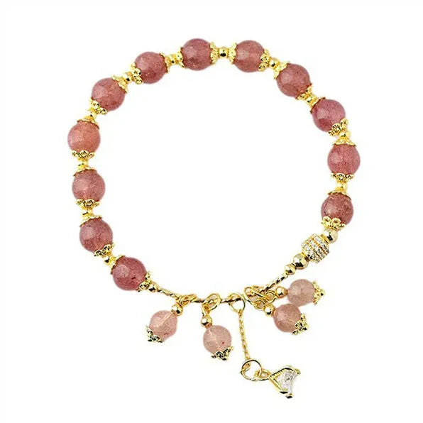 Women's pink strawberry quartz crystal bracelet with heart-shaped charms and pearl decorative elements