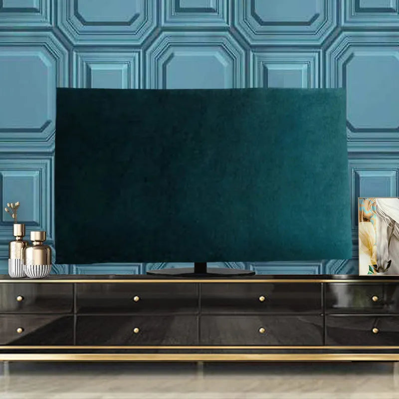 Pink velvet fabric cover draped over a large flat-screen television.
