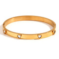 Golden electroplated stainless steel bracelet with micro-inlaid peach heart charm for women