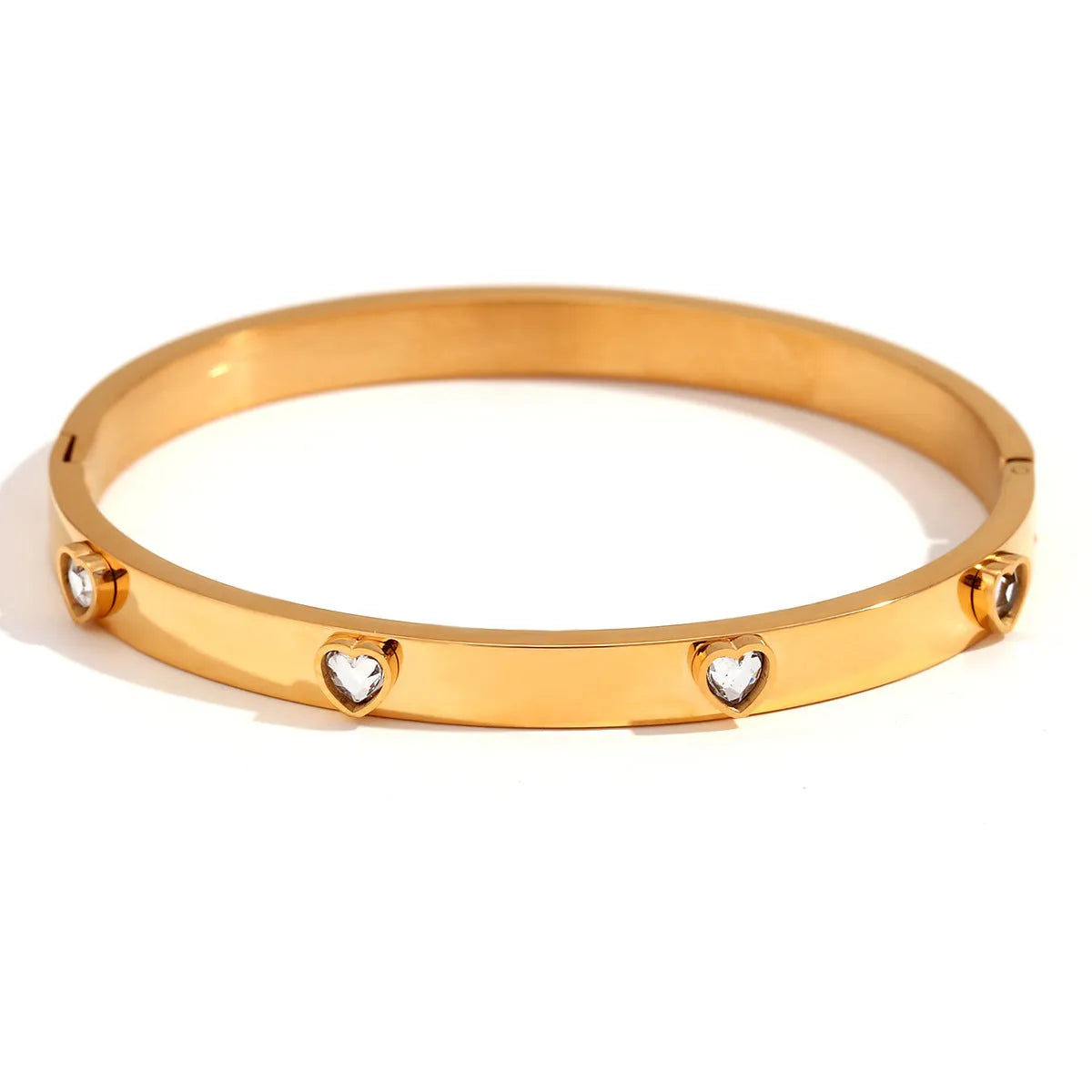 Golden electroplated stainless steel bracelet with micro-inlaid peach heart charm for women