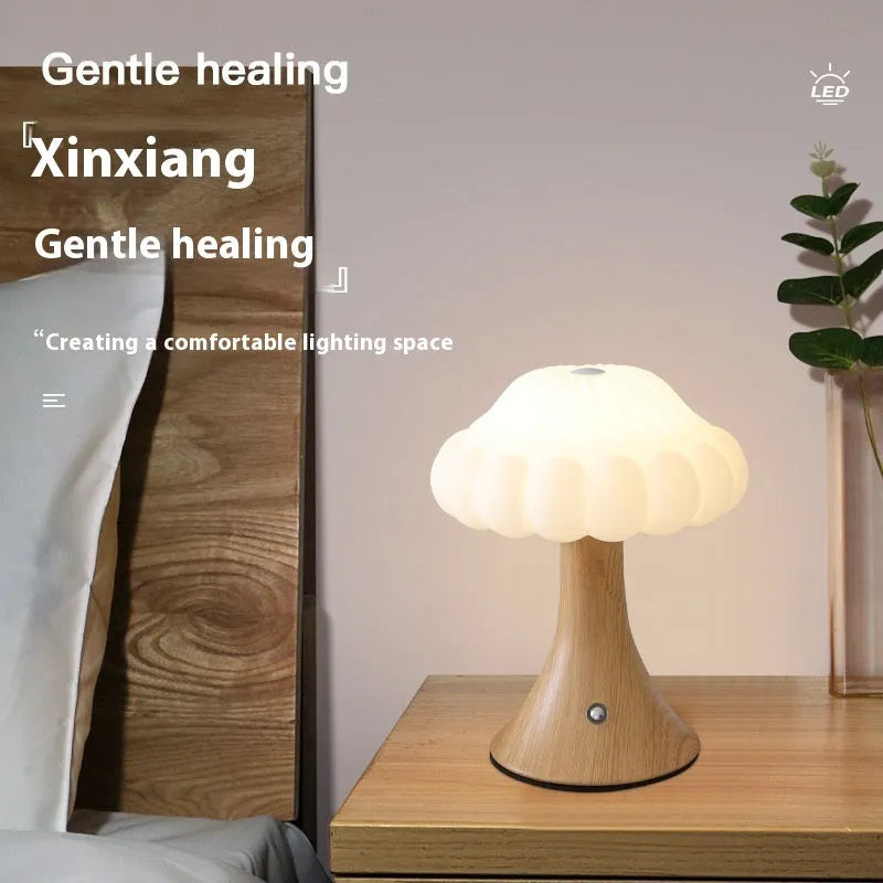 Creative mushroom-shaped night light in wood grain finish with USB charging port