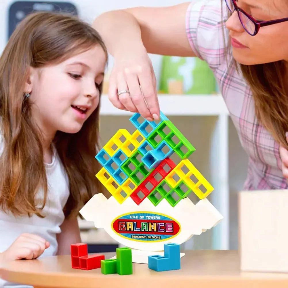 Plastic balance stacking game with 16 colourful building blocks, chassis, and base on a 26.5cm board.