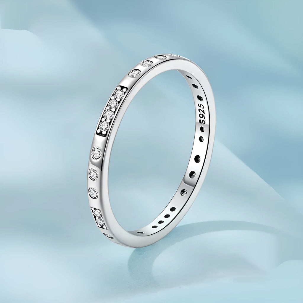 Oxidised black silver 'I Love You' moss password fashion ring on a hand, showing its bracelet-style design.
