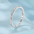 Oxidised black silver 'I Love You' moss password fashion ring on a hand, showing its bracelet-style design.