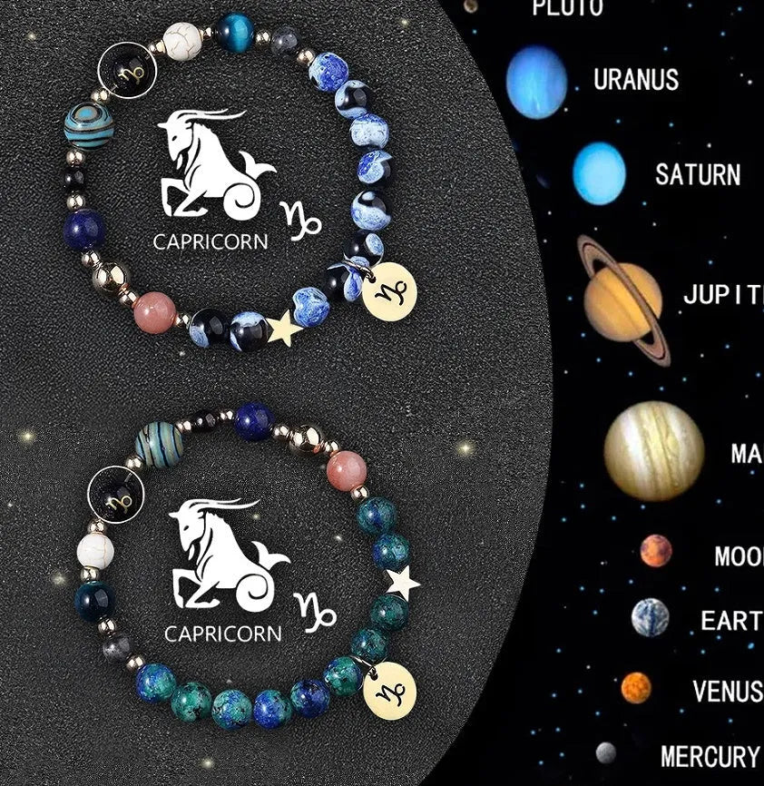 Two natural stone beaded bracelets with zodiac sign charms on a dark background.