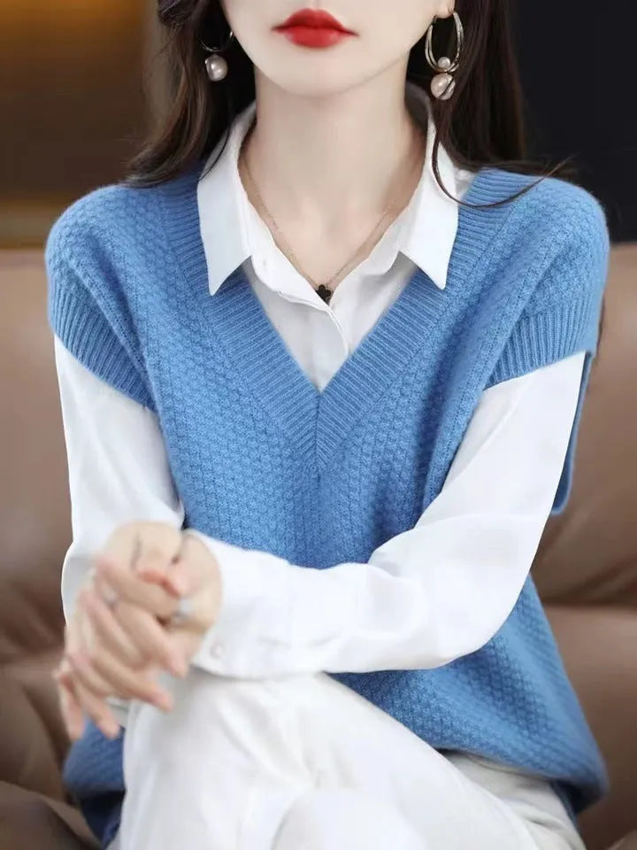 Sleeveless pullover vest with 3D knit pattern in creamy-white colour, shown on hanger