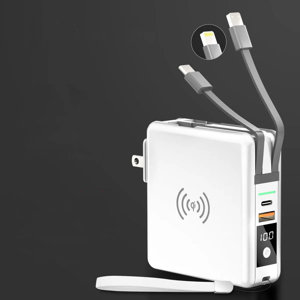 Black and white Super QI wireless charging power bank with integrated plug and international adaptors.