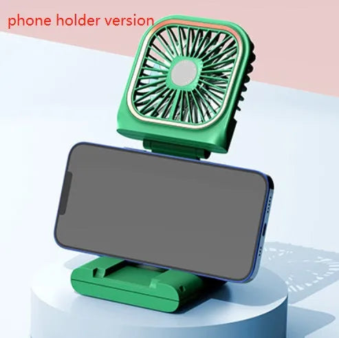 A person wearing a black hands-free neck fan with dual blue cooling fans and a USB charging cable.