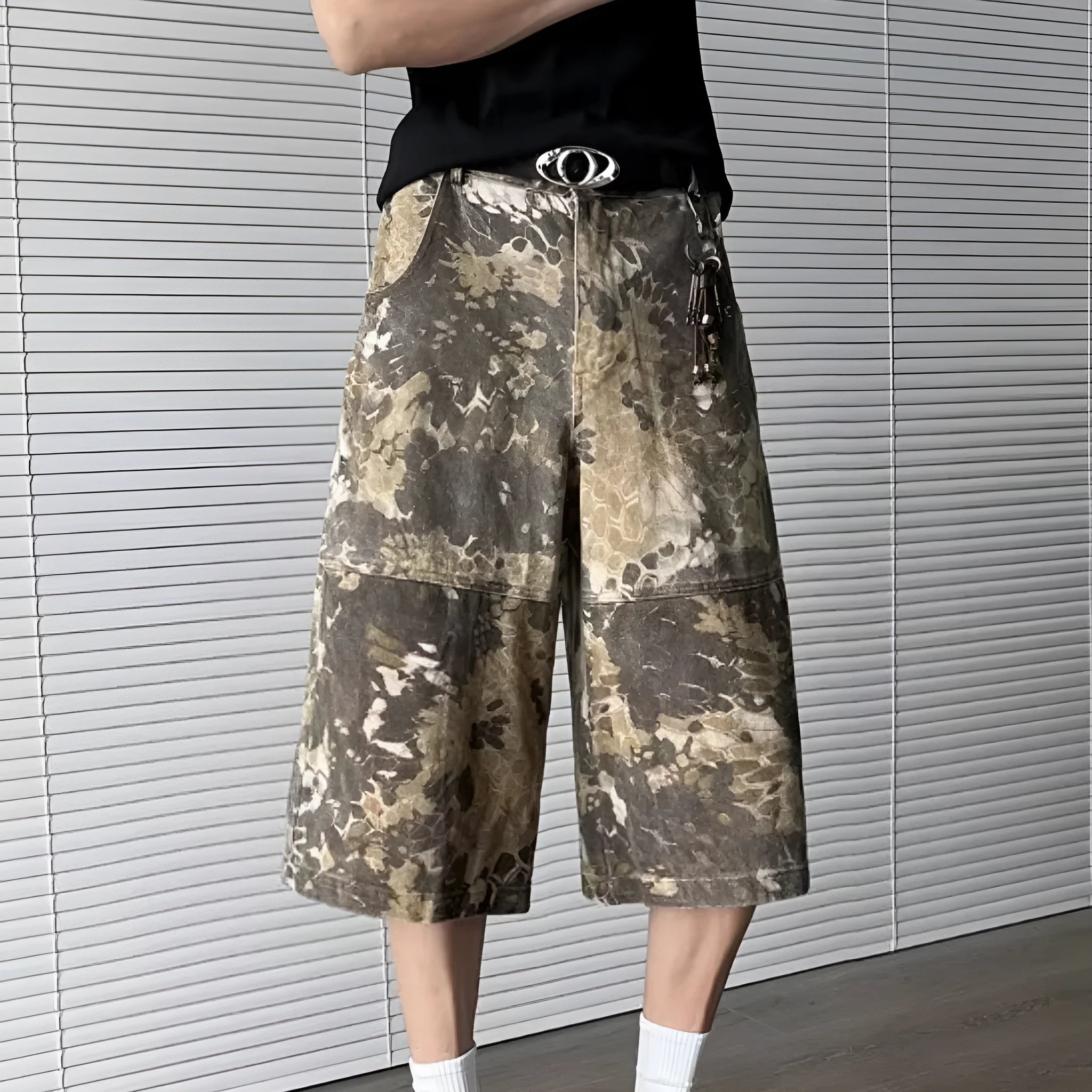 Yellow women's jeans with snake camouflage pattern and cropped length